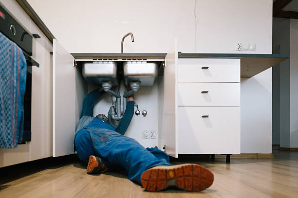 Professional Emergency Plumber technician working in Fellows, CA